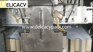 Servo stacker for printed tinplate sheets